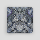 What If Prima Donna Grey/Blue baroque damask quilting fabric by Paula Nadelstern for Benartex, folded on light grey background