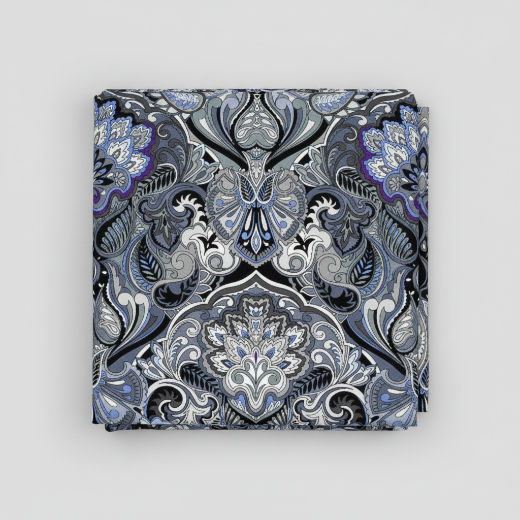 What If Prima Donna Grey/Blue baroque damask quilting fabric by Paula Nadelstern for Benartex, folded on light grey background