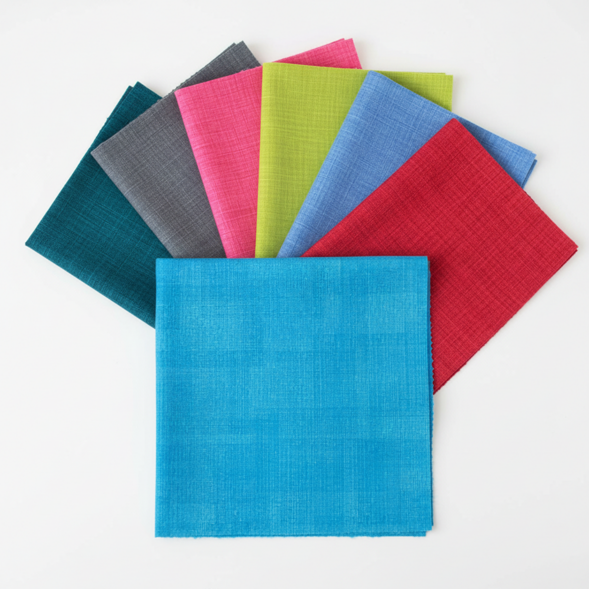 Interwoven Deep Sky Fabric by Jason Yenter for In The Beginning Fabrics — vivid sky blue crosshatch tonal as the hero fabric in a coordination fan with coordinating Interwoven colorways fanned behind. 100% cotton, 43–44" wide.