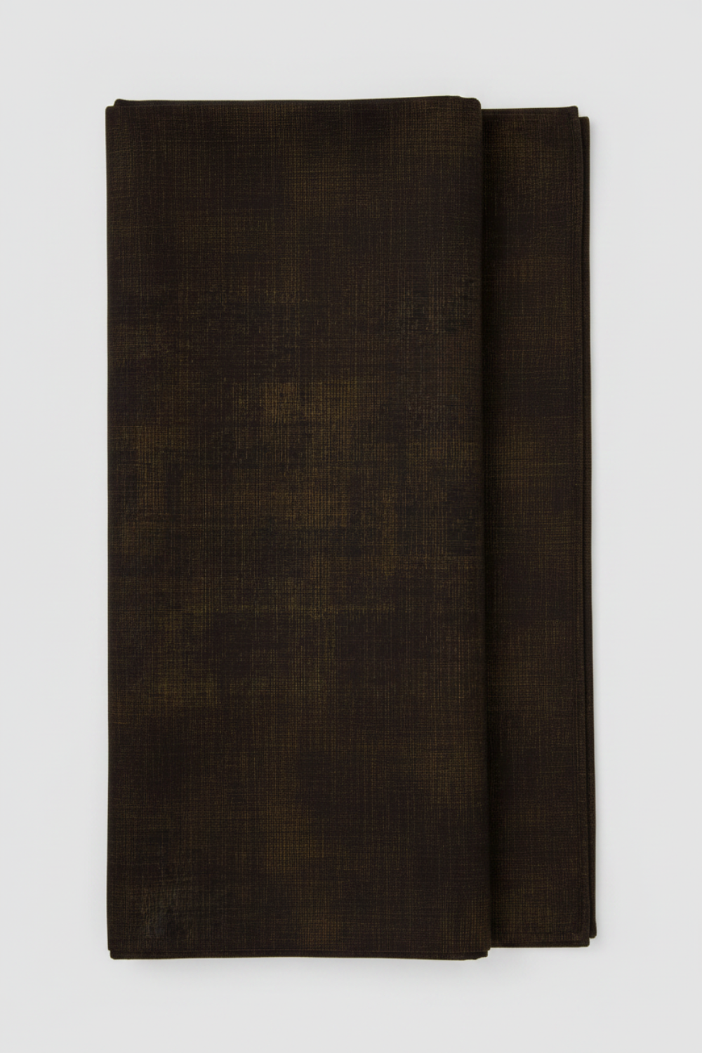 Folded Interwoven Espresso quilting cotton fabric on a light grey background – by Jason Yenter for In The Beginning Fabrics. Shop at IraRobi Quilts | #espressofabric #interwoven #quiltingfabric #darkfabric #blenderfabric