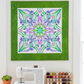 Interwoven Green Fabric by Jason Yenter for In The Beginning Fabrics as a wide border on the Dream Big Ethereality Dragonfly Quilt Panel by Jeanie Sumrall-Ajero for Hoffman Fabrics — vivid grass green crosshatch tonal framing the kaleidoscopic mandala panel in a bright sewing studio. Quilt blocks shown for inspiration. Coordinating fabrics and quilt patterns are available at IraRobi Quilts.