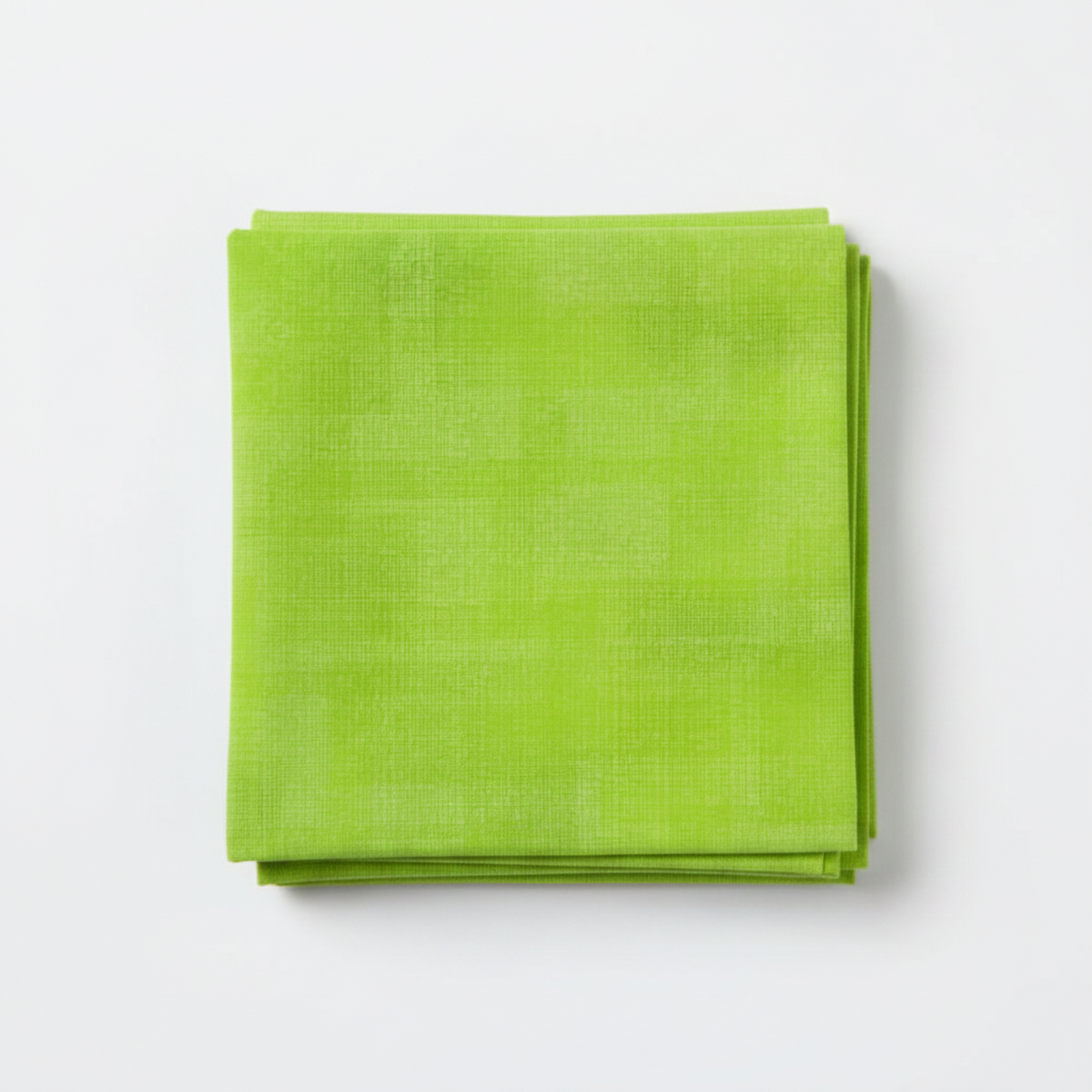 Interwoven Lime Fabric by Jason Yenter for In The Beginning Fabrics — neatly folded fat quarter showing vivid lime green crosshatch texture with subtle chartreuse to grass green tonal shifts. Clean white surface, soft natural light. 100% cotton, 43–44" wide.
