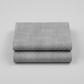Interwoven Pewter Fabric by Jason Yenter for In The Beginning Fabrics folded to show the cool medium grey geometric crosshatch print and texture