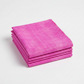 Interwoven Pink quilting cotton by Jason Yenter for In The Beginning Fabrics — neatly folded fat quarter stack showing vivid magenta-pink crosshatch texture print with subtle tonal shifts from bright hot pink to soft rose. Clean white surface, soft natural light. 100% cotton, 43–44" wide.