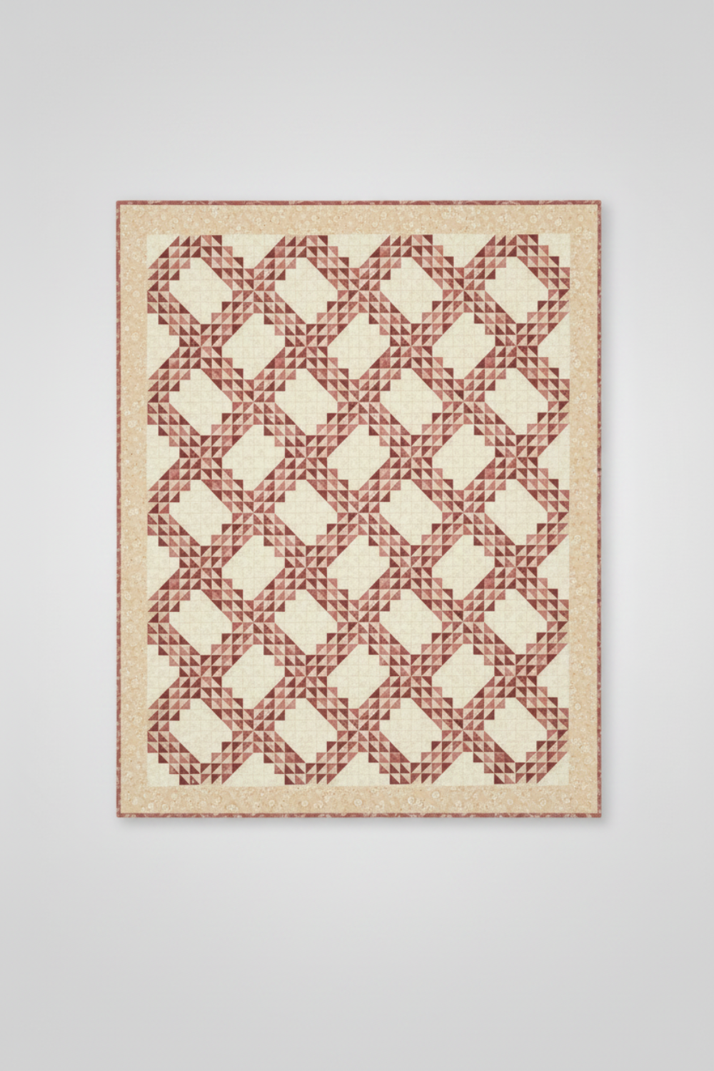The Fox Homestead Cream Swirl Floral Texture Fabric by Stacy West for Henry Glass — vertical view of the Kelley Quilt Pattern by Edyta Sitar of Laundry Basket Quilts, interlocking chain half-square triangle design in dusty rose, mauve, and burgundy. Quilts shown for inspiration feature the Kelley Quilt Pattern by Edyta Sitar of Laundry Basket Quilts — available at IraRobi Quilts.