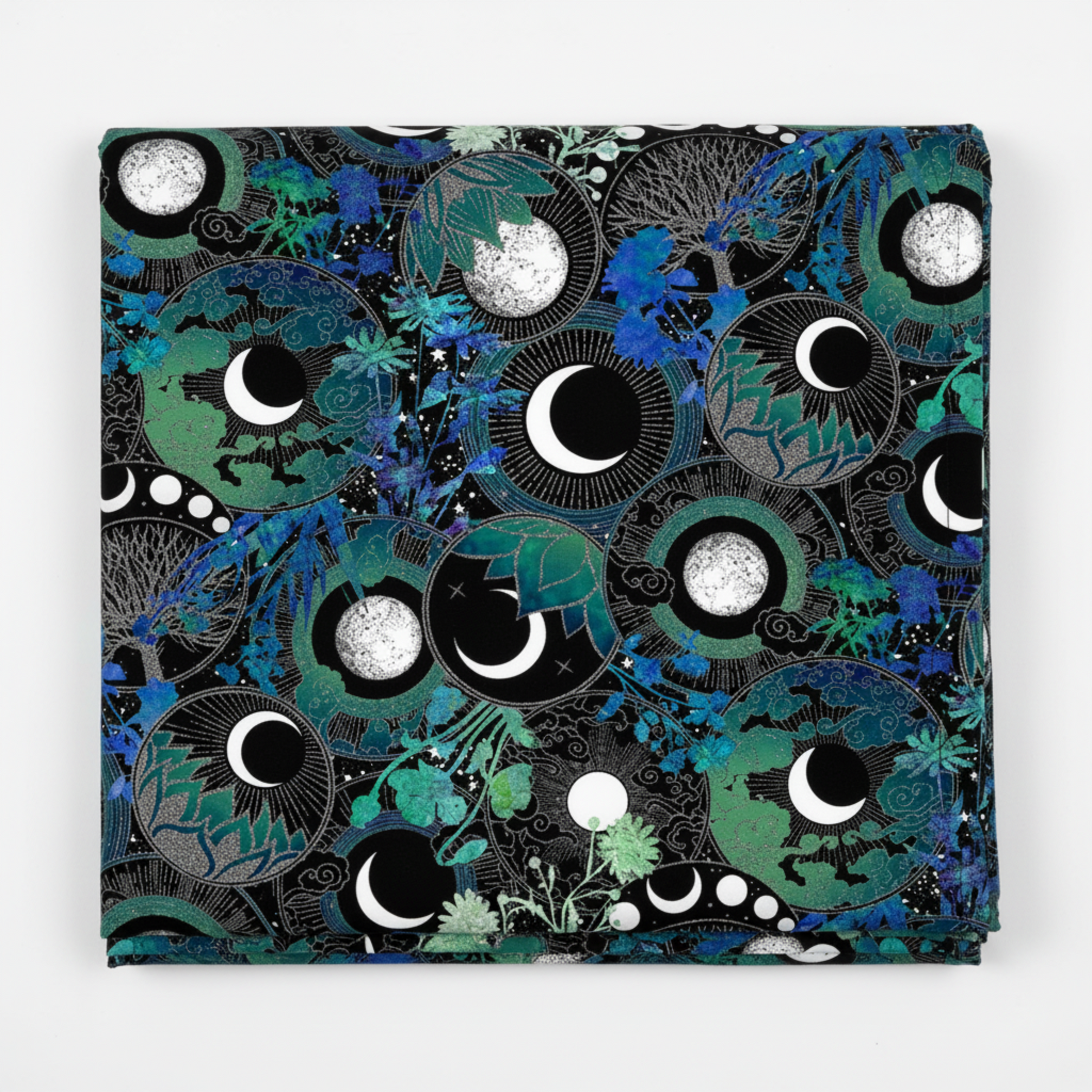La Luna Blue Silver Moon Collage quilting cotton fabric folded to show dramatic allover collage with overlapping moon phase medallions, silver radiating lines, crescent and full moons, chrysanthemums, succulents, bats, and clouds in teal, emerald, cobalt, and silver on deep black by Jason Yenter for In The Beginning Fabrics, 100% cotton, 3 yard cut