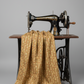 Front Porch by Dolores Smith, Railings Gold for Marcus Fabrics — olive-gold quilting cotton with vertical leaf garland stripes