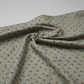 he Fox Homestead Slate Blue Green Tossed Cubes quilting cotton by Stacy West for Henry Glass — fabric draped softly showing muted slate blue-green ground with tossed tumbling cube motifs in gold, cream, and burgundy