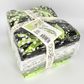 Maywood Studio Greenery Fat Quarter Bundle – side view showing 20 fabric layers in black, white and green botanical prints with Maywood Studio ribbon and Greenery label