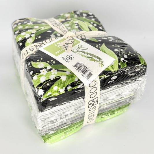 Maywood Studio Greenery Fat Quarter Bundle – side view showing 20 fabric layers in black, white and green botanical prints with Maywood Studio ribbon and Greenery label