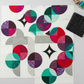 Moondance quilt in progress with Interwoven Charcoal by Jason Yenter for In The Beginning Fabrics – curved petal pieces in deep charcoal, white, teal, magenta and purple with loosely folded fat quarter, pins and thread. Shop Interwoven Charcoal at IraRobi Quilts | #moondance #quiltingfabric #charcoalfabric #interwoven #quiltwip #modernquilt