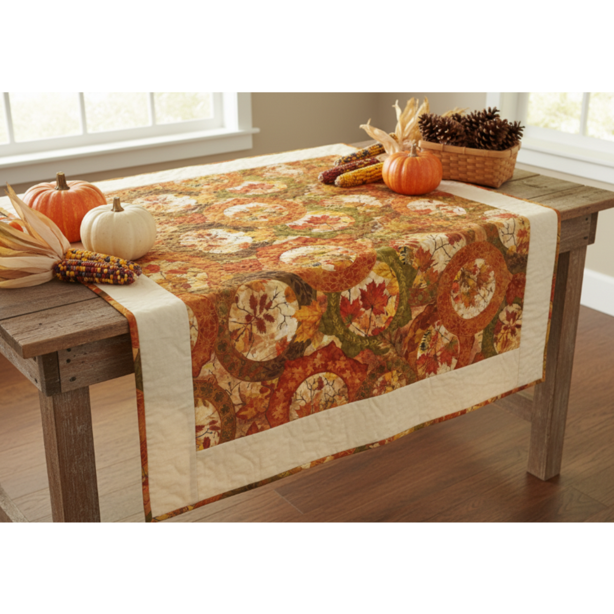 Autumn Celebration Multi Circles fabric by Jason Yenter for In The Beginning Fabrics used as focal border fabric in a fall quilt project — large overlapping medallion circles with autumn maple leaves in crimson, orange, gold, and olive. Quilts shown for inspiration. Coordinating fabrics and quilt patterns available at IraRobi Quilts.
