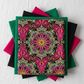 Needle Stars Byzantium Red/Multi by Paula Nadelstern for Benartex shown in a coordinating fabric stack with solid jewel-tone companions in magenta, forest green, hot pink, and black. Quilt blocks shown for inspiration. Coordinating fabrics and quilt patterns are available at IraRobi Quilts.