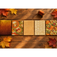 Five coordinating fall quilting fabric swatches side by side on a rustic wooden table, with maple leaves and a spool of thread