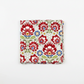 NYSNO New Snow Multicolor Floral quilting cotton by Jason Yenter for In The Beginning Fabrics — folded fat quarter on a white surface showing oversized bold folk-art florals in crimson red with white petal cutwork, cobalt blue accent flowers with gold centers, olive green stems, white snowflakes, and gold stars on soft mottled light grey. 100% cotton, 43–44" wide.