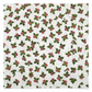 NYSNO New Snow White Holly quilting cotton by Jason Yenter for In The Beginning Fabrics — close-up flat lay showing tossed holly leaves in forest green with deep red berry clusters on a soft mottled white ground, bold festive allover print, 100% cotton, 43–44" wide.