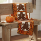 Autumn Celebration Multi Small Foliage fabric by Jason Yenter as border fabric in the Oh Snap! gingerbread bench pillow and table runner by Jennie Jo Lamb for Lamb Farm Designs. Cozy fall holiday sewing project. Quilts shown for inspiration feature the Oh Snap! pattern by Jennie Jo Lamb — available at IraRobi Quilts.