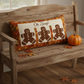 Autumn Celebration Multi Small Foliage fabric used as border in the Oh Snap! bench pillow by Jennie Jo Lamb for Lamb Farm Designs — gingerbread person appliqué runner on a farmhouse bench with small pumpkin and fall leaves. Quilts shown for inspiration feature the Oh Snap! pattern by Jennie Jo Lamb — available at IraRobi Quilts.