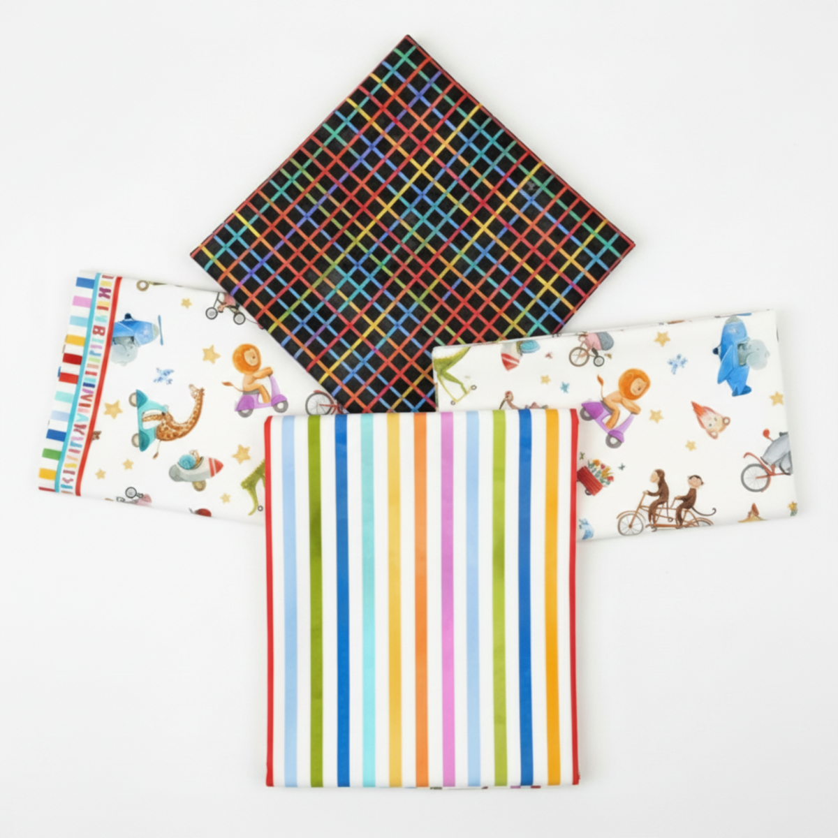 On the Go Plaid Multi quilting cotton by Jason Yenter for In The Beginning Fabrics — shown as the hero on top of a coordinating fabric fold stack on a clean white surface with bright studio lighting.