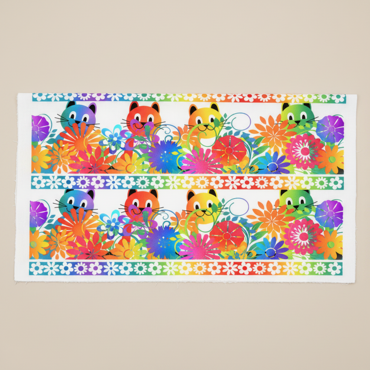 PAWsitivity White Border Stripe quilting cotton by Jason Yenter for In The Beginning Fabrics — flat lay showing two full horizontal stripe repeats: cheerful cartoon cats in teal-blue, red-orange, golden yellow, and lime green peeking from dense rainbow floral bouquets, separated by narrow white daisy chain stripes, 100% cotton, 43–44" wide, sold by the yard.
