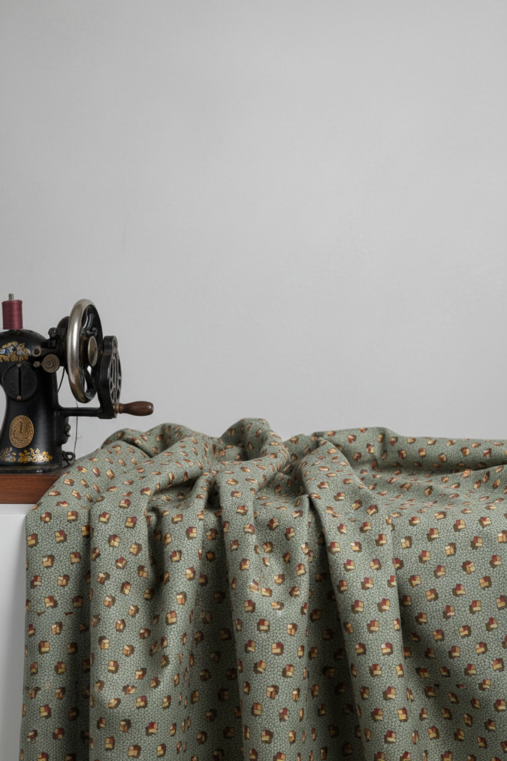 The Fox Homestead Slate Blue Green Tossed Cubes by Stacy West for Henry Glass — slate blue-green quilting cotton with tumbling cube motifs in gold, cream, and burgundy, 100% cotton 43–44" wide
