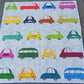 Quilt with colorful car patterns on a white background