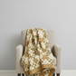 Traditional star quilt in a minimal living room setting — Front Porch collection by Dolores Smith for Marcus Fabrics, sage green, cream, and olive-gold coordinating quilting cottons, 100% cotton