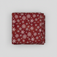 Winter Solstice II Red Snowflakes Metallic quilting cotton by Jason Yenter for In The Beginning Fabrics — folded fabric bolt showing tossed white snowflakes in multiple sizes on rich mottled burgundy with tiny gold metallic star dots, 100% cotton with metallic accents, 43–44" wide. Quilt blocks shown for inspiration. Coordinating fabrics and quilt patterns are available at IraRobi Quilts.