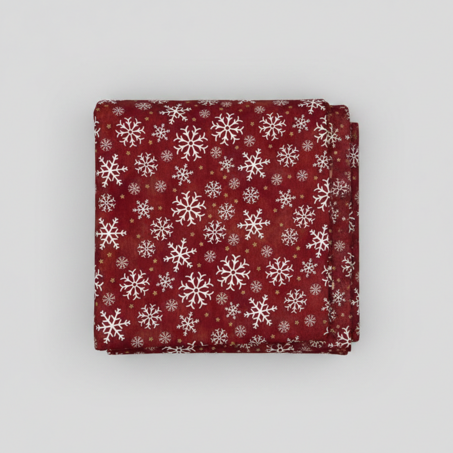 Winter Solstice II Red Snowflakes Metallic quilting cotton by Jason Yenter for In The Beginning Fabrics — folded fabric bolt showing tossed white snowflakes in multiple sizes on rich mottled burgundy with tiny gold metallic star dots, 100% cotton with metallic accents, 43–44" wide. Quilt blocks shown for inspiration. Coordinating fabrics and quilt patterns are available at IraRobi Quilts.