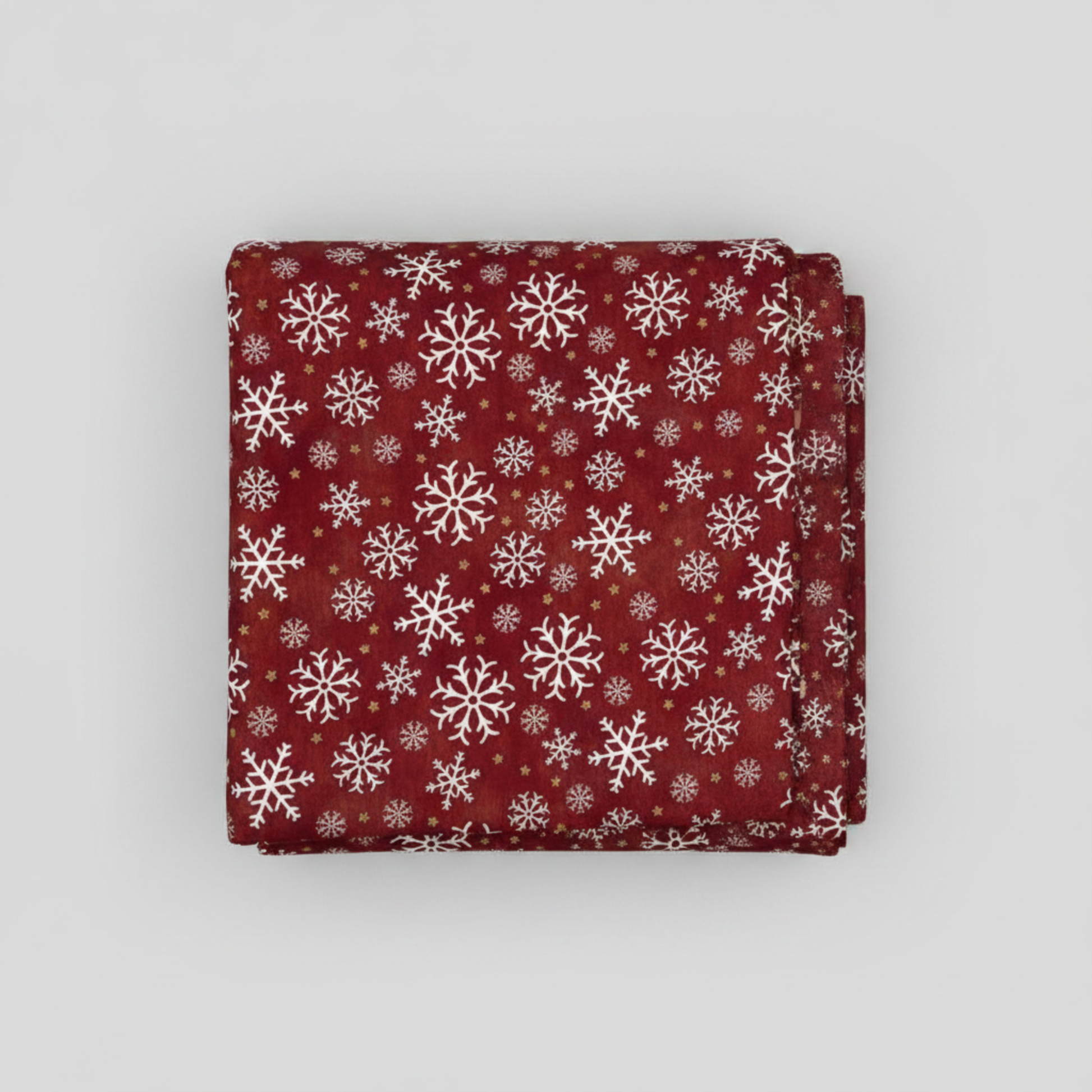 Winter Solstice II Red Snowflakes Metallic quilting cotton by Jason Yenter for In The Beginning Fabrics — folded fabric bolt showing tossed white snowflakes in multiple sizes on rich mottled burgundy with tiny gold metallic star dots, 100% cotton with metallic accents, 43–44" wide. Quilt blocks shown for inspiration. Coordinating fabrics and quilt patterns are available at IraRobi Quilts.