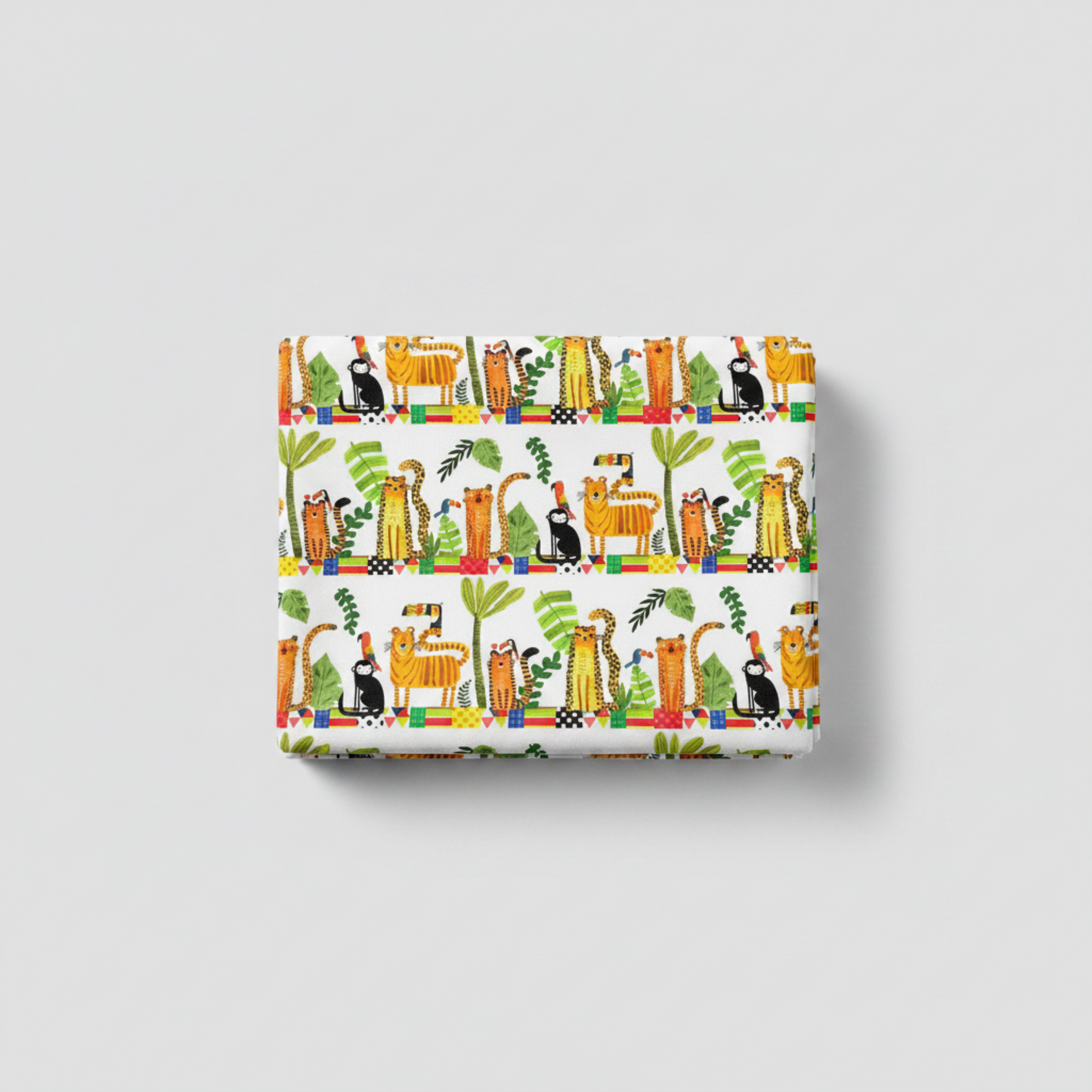 Safari Fun Stripe White/Multi by Terry Runyan for Benartex – neatly folded fabric stack showing full jungle animal stripe repeat with colorful geometric border strips, light grey background