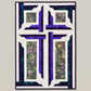 The Wondrous Cross quilted wall hanging shown against light grey, featuring a white cross framed by purple, teal, and floral batik patchwork.