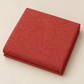 Folded Breezeway Medium Red Palm Patterns fabric displayed on a neutral background, showing its subtle tone-on-tone red geometric texture.