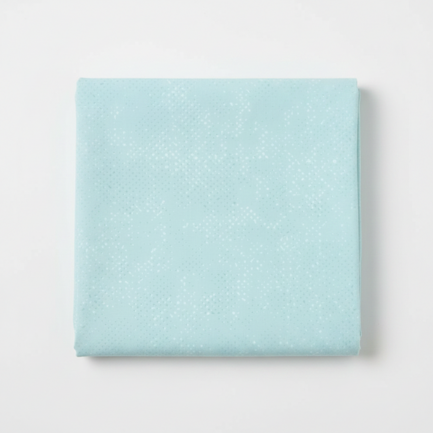 Spotted Mist quilting cotton fabric by Zen Chic for Moda Fabrics showing soft pale icy aqua-blue ground with subtle tonal speckled texture – a delicate near-solid blender, 100% cotton, 43–44" wide