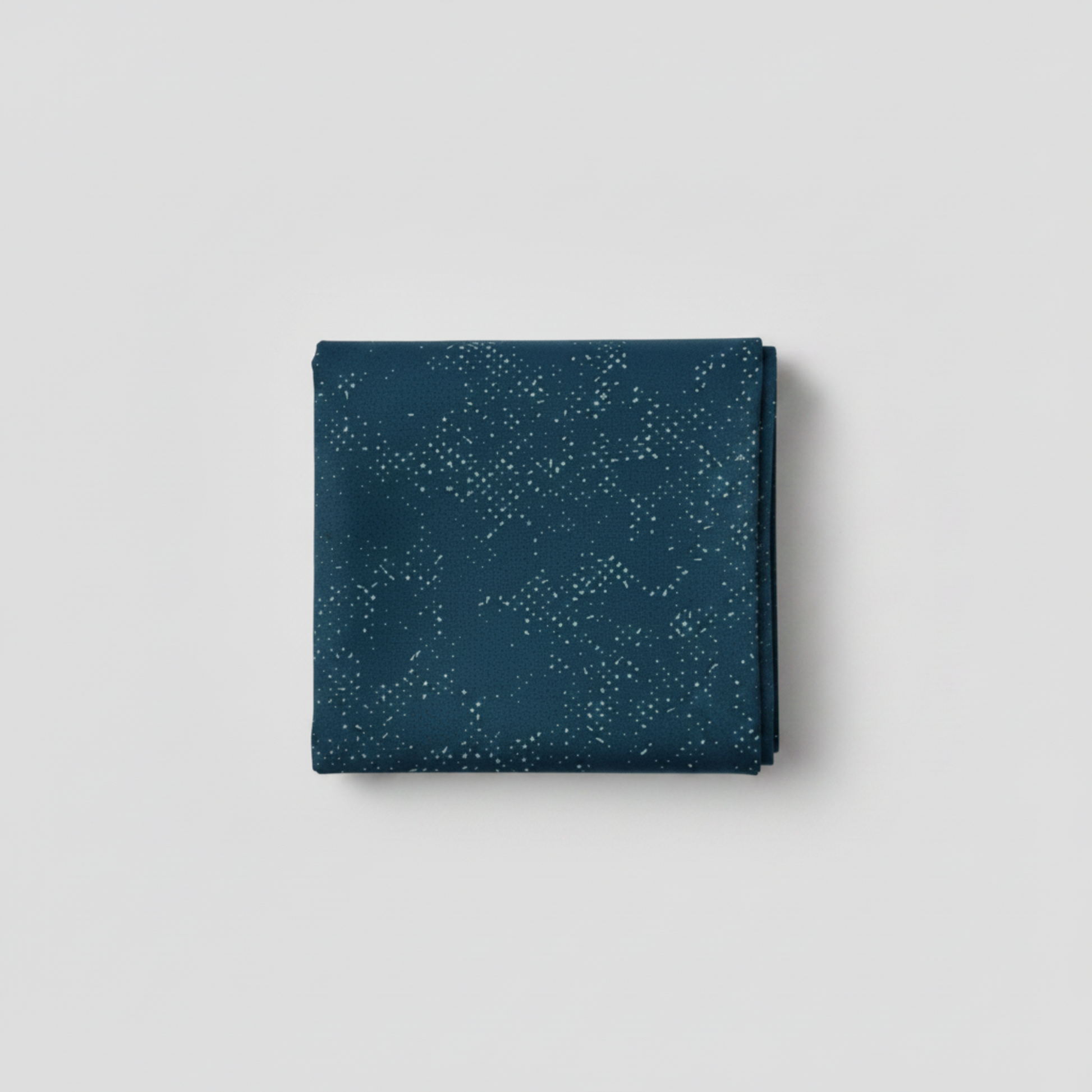 Spotted Mood Dark Blue fabric by Zen Chic for Moda Fabrics — deep teal-navy ground with scattered light dot texture, 100% cotton quilting blender. Available at IraRobi Quilts.