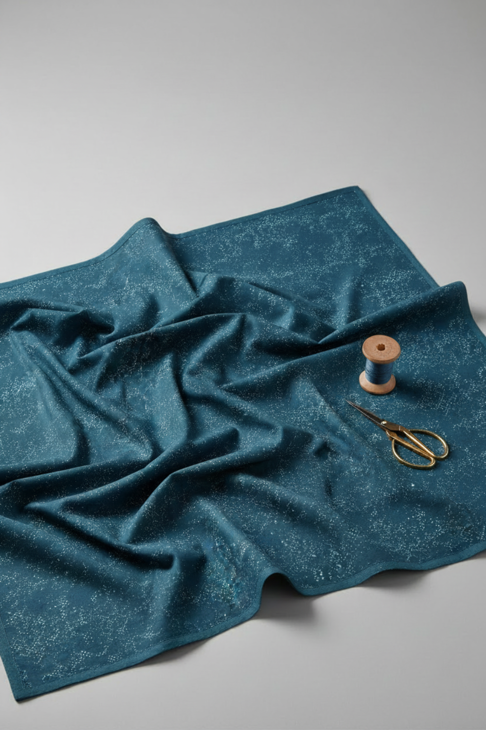 Spotted Mood Dark Blue fabric by Zen Chic for Moda Fabrics — deep teal-navy ground with scattered light dot texture, 100% cotton quilting blender. Available at IraRobi Quilts.