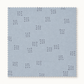 Square swatch of Celestial Nine Triangle Stardust fabric by Zen Chic for Moda Fabrics, featuring scattered charcoal triangle clusters on pale blue-gray.