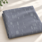 Folded Celestial Strokes Aluminum fabric by Zen Chic for Moda Fabrics displayed in soft natural light.