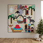 Starry Night nativity quilt displayed above a cream sofa beside a small illuminated Christmas tree.