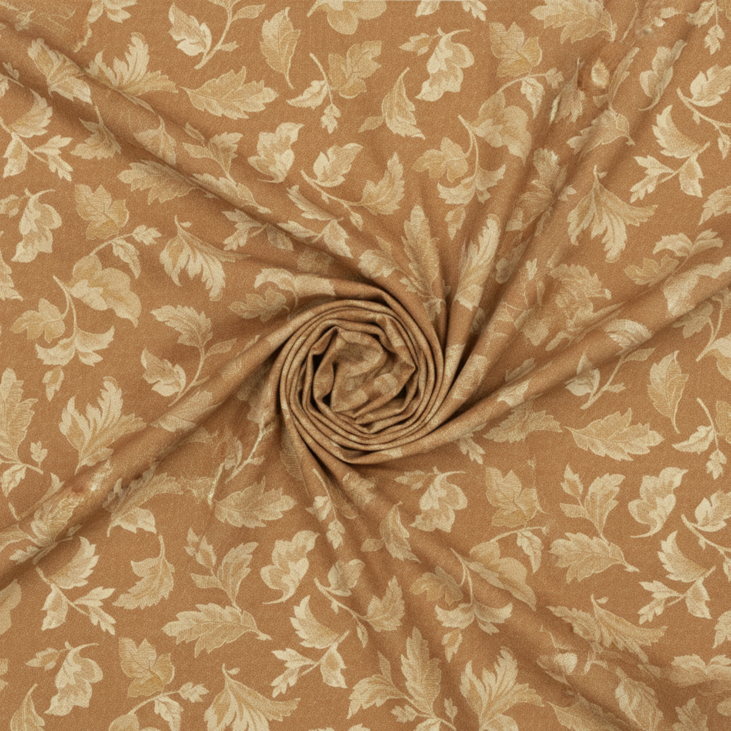 Front Porch Swing Rust quilting cotton by Dolores Smith for Marcus Fabrics — fabric swirled into a spiral pinwheel showing softness and drape, warm rust-amber ground with cream scrolling acanthus leaf motif