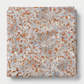 Terrazzo Coastal Path Fabric by Riley Blake Designs neatly folded on a light-gray background, showing its peach and copper terrazzo-style print.