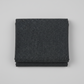 Texture Graphix Speckle Black quilting cotton fabric folded to show texture – tonal charcoal-black speckled blender by Jason Yenter for In The Beginning Fabrics, 100% cotton