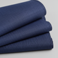 olded Thatched Navy quilting cotton by Robin Pickens for Moda Fabrics on a light grey background.