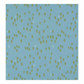 Olive You Dots Glacier Fabric by Zen Chic for Moda Fabrics, with green and pale oval dots on glacier blue, centered on a white background.