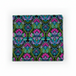 Vivid Brocade Jewel quilting cotton fabric folded to show dramatic allover baroque brocade with large magenta and purple damask florals, teal scrolling leaves, green botanical motifs, and chartreuse accents on deep black by Jason Yenter for In The Beginning Fabrics, 100% cotton, 3 yard cut