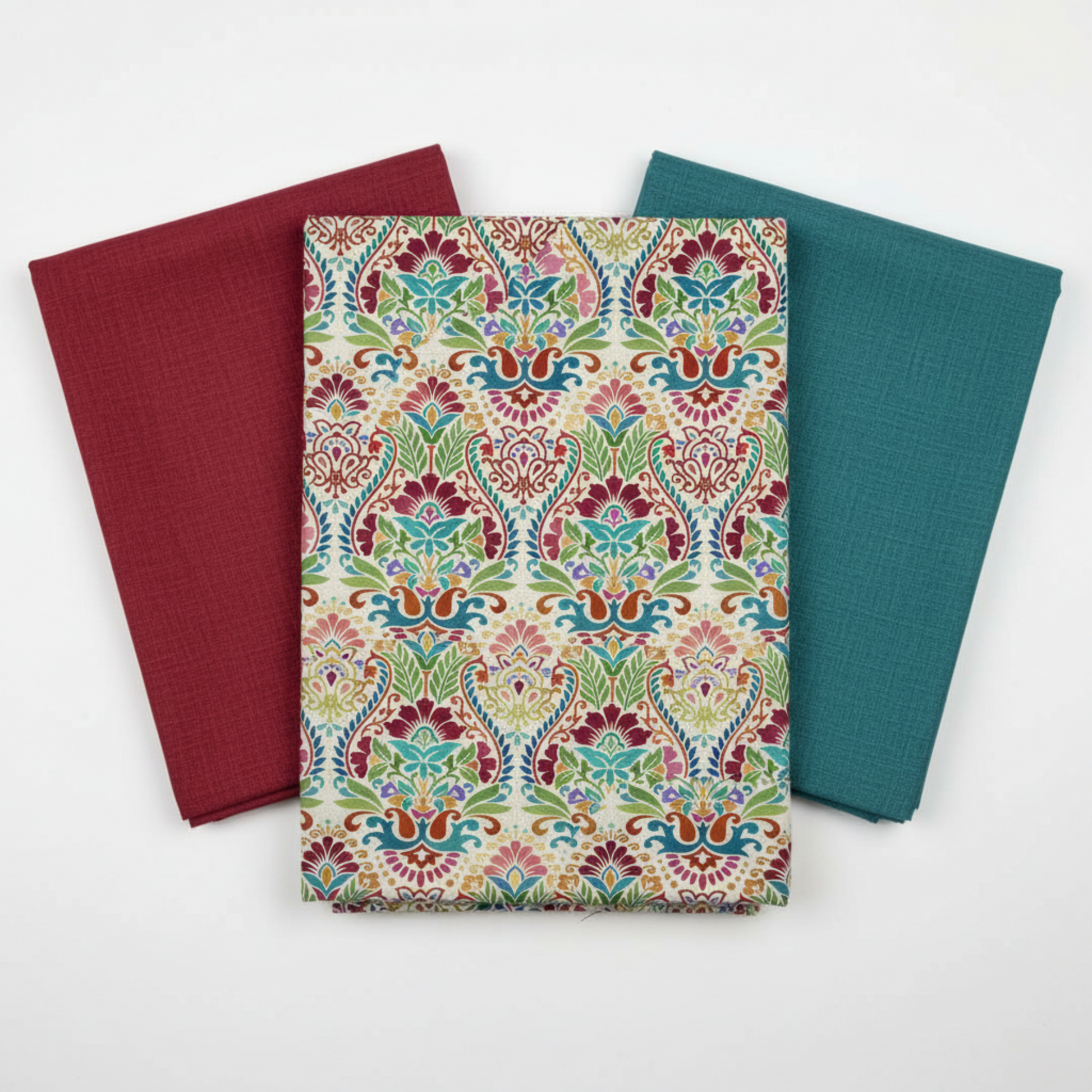 Vivid Brocade Spice quilting cotton fabric by Jason Yenter for In The Beginning Fabrics shown in a coordinate fan with Red and Teal blenders – dramatic allover baroque brocade with crimson and burgundy damask florals and teal scrolling leaves on warm cream, 100% cotton, 3 yard cut