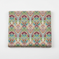 Folded swatch (1:1 — Shopify): Vivid Brocade Spice quilting cotton fabric folded to show dramatic allover baroque brocade with deep crimson and burgundy damask florals, teal scrolling leaves, olive green botanicals, and gold and amber accents on warm cream and ivory by Jason Yenter for In The Beginning Fabrics, 100% cotton, 3 yard cut