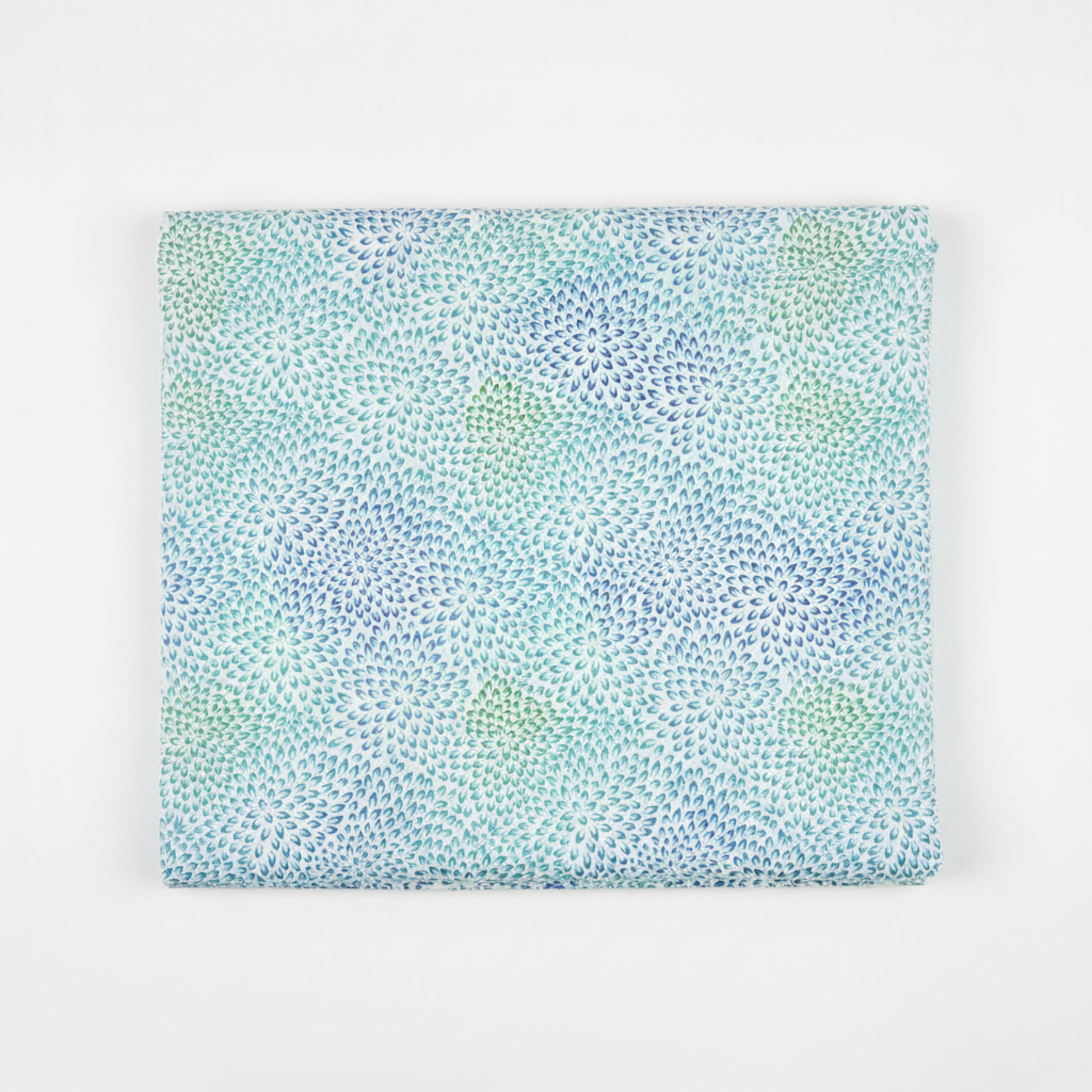 Vivid Mums Jewel Blue quilting cotton fabric folded to show dense allover chrysanthemum burst blender with hundreds of tiny pointed petals radiating in spiraling formations in periwinkle blue, cobalt, teal, aqua, and sage green on very light pale blue and silver by Jason Yenter for In The Beginning Fabrics, 100% cotton, 3 yard cut