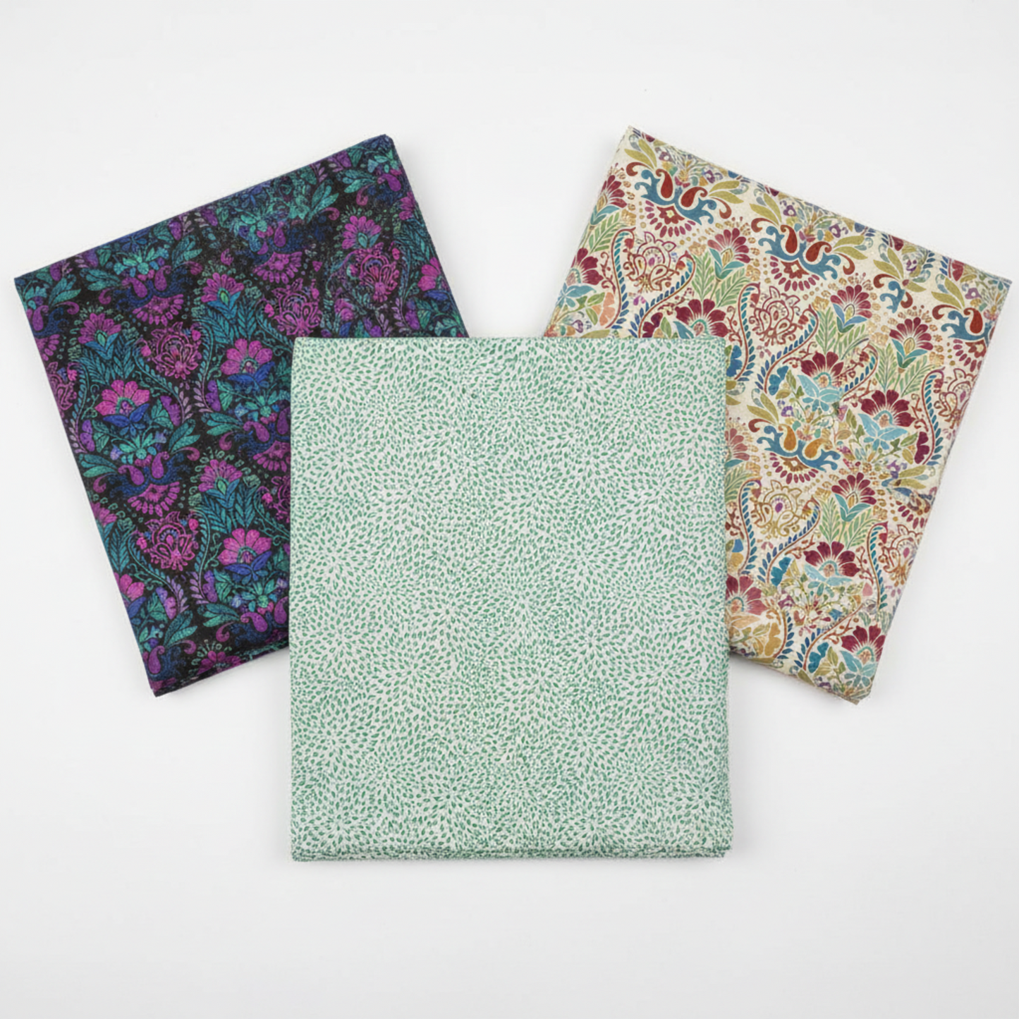 Vivid Mums Spice Teal quilting cotton fabric by Jason Yenter for In The Beginning Fabrics shown in a coordinate fan with Vivid Brocade Jewel and Vivid Brocade Spice – dense chrysanthemum burst blender in teal and emerald on cream-grey with magenta baroque brocade on black and crimson baroque brocade on warm cream, 100% cotton, 3 yard cuts