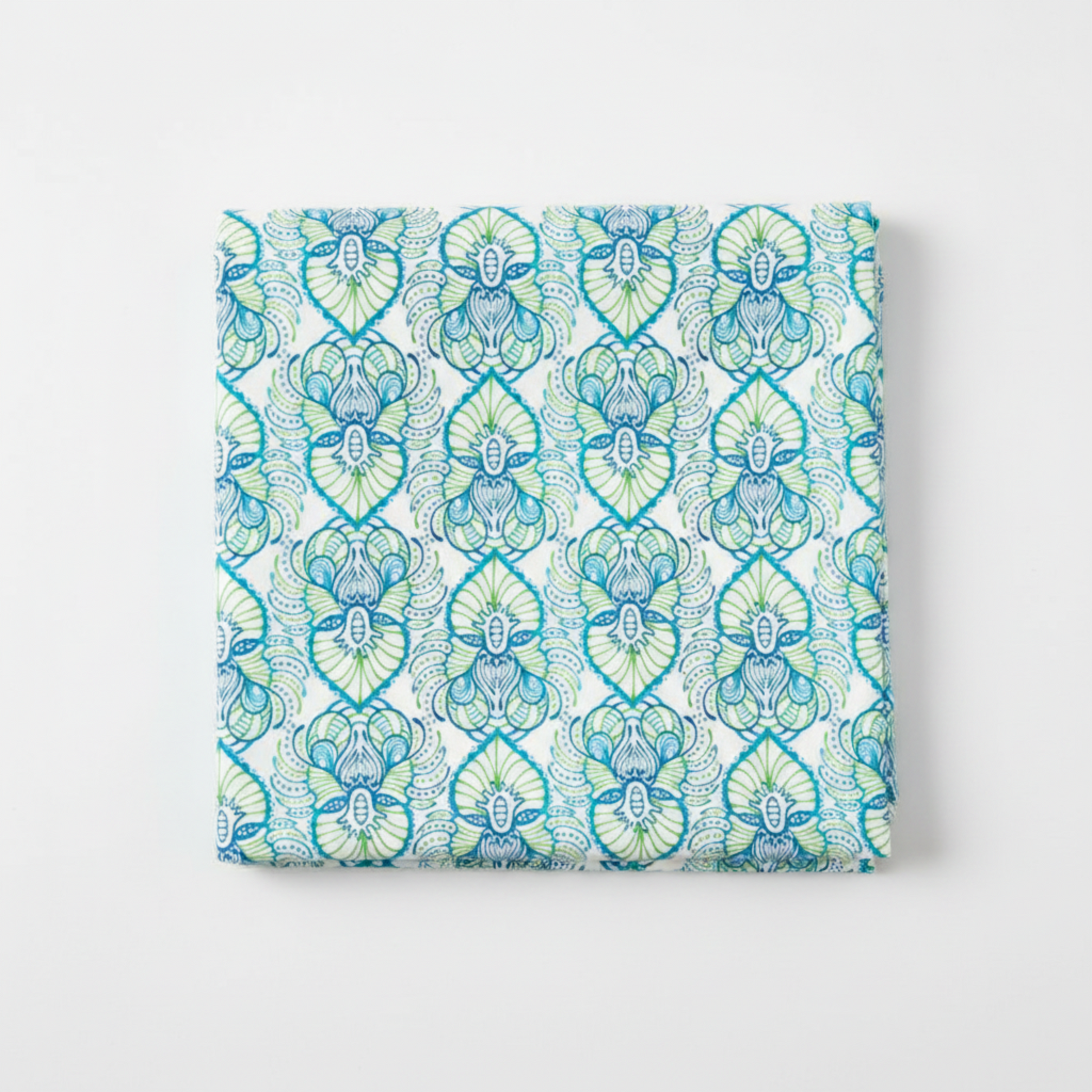 Wonders Of The Ocean Abstract quilting cotton fabric folded to show allover ogee trellis lattice with ornate Art Nouveau botanical medallions featuring feathery fronds, scrolling tendrils, and dotted borders in turquoise, cobalt blue, and chartreuse green on crisp white by Jason Yenter for In The Beginning Fabrics, 100% cotton, 3 yard cut